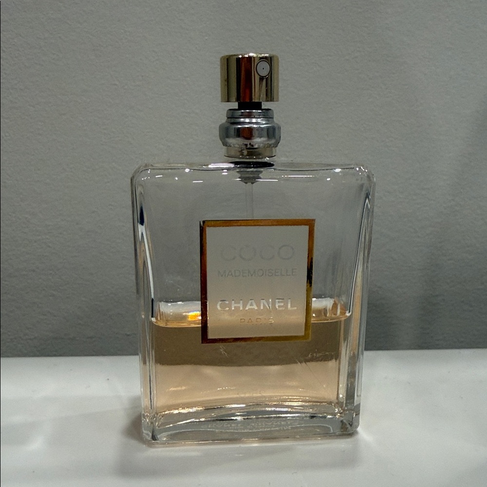 CHANEL Clear Glass Perfume Bottle with Gold Accents